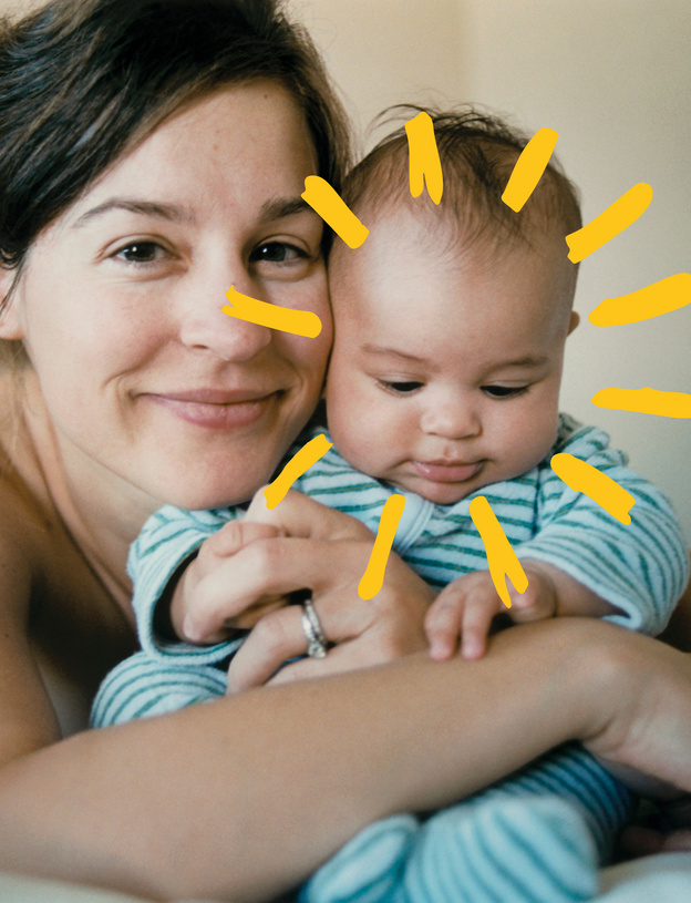 Mom holding cute baby sunshine 